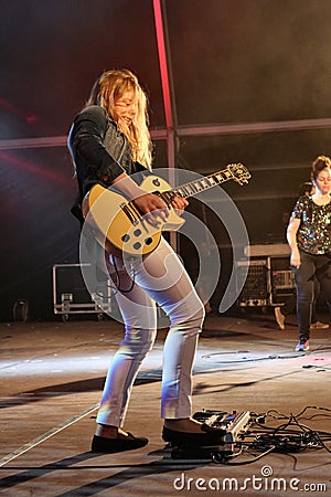 Girl Playing Guitar Editorial Stock Photo