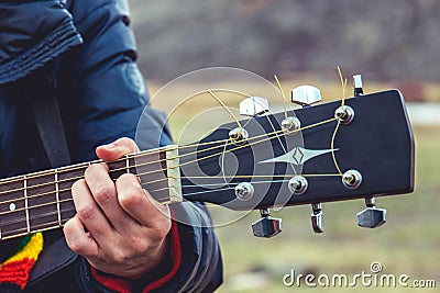 Girl playing guitar Stock Photo