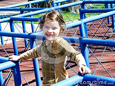 Girl playing in park maze Stock Photo
