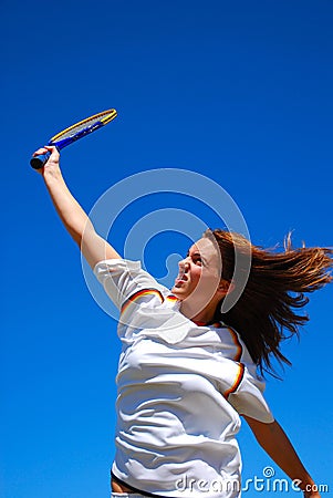 Girl playing tennis Stock Photo