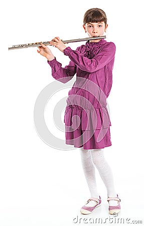 Girl playing transverse flute Stock Photo