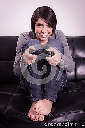 Girl playing video games Stock Photo