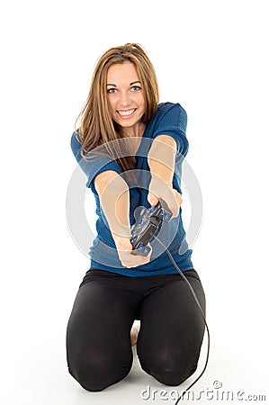 Girl playing video games on the joystick Stock Photo