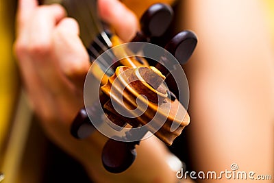 Girl playing the violin classical music concert Stock Photo