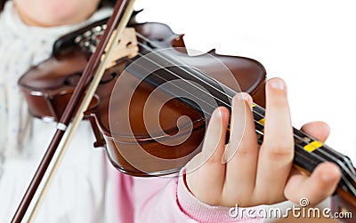 Girl playing the violin Stock Photo