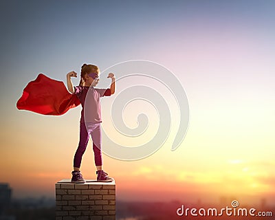 Girl plays superhero Stock Photo