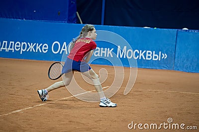 Girl plays tennis on the field Editorial Stock Photo