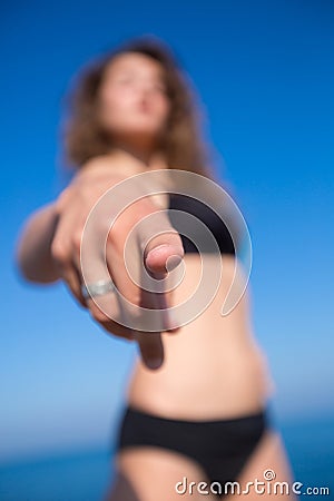Girl point a finger Stock Photo