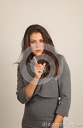 Girl pointing her finger Stock Photo