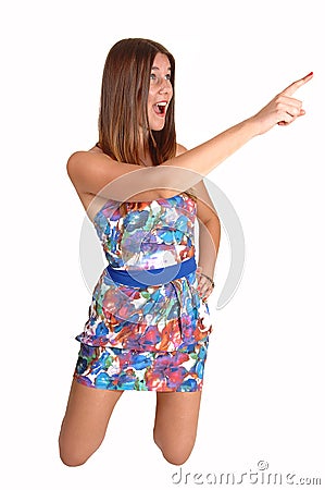 Girl pointing with her finger. Stock Photo