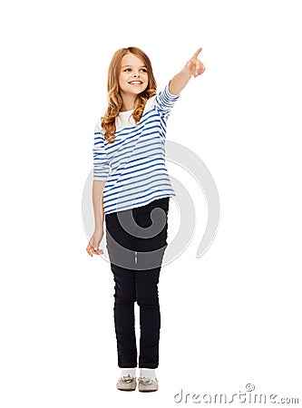 Girl pointing at imaginary screen Stock Photo