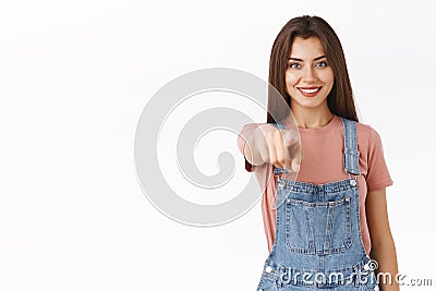 Girl pointing at you as making choice, gather team. Attractive confident and motivated cute female indicating camera Stock Photo