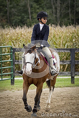 Girl and pony Stock Photo