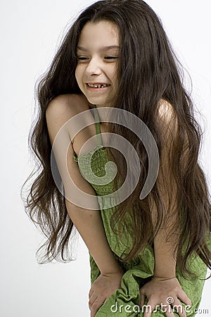 Girl posing in green dress Stock Photo