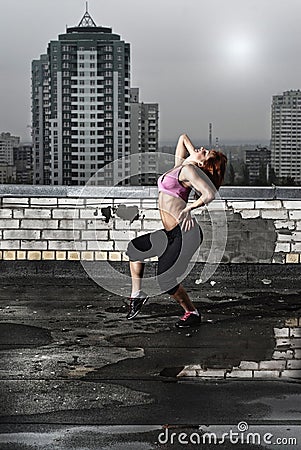 Girl posing on the roof Stock Photo