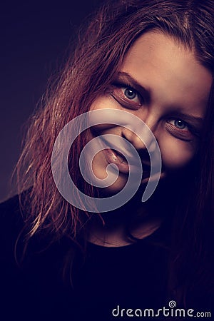 Girl possessed by a demon Stock Photo