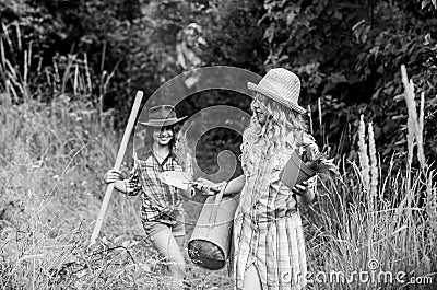 Girl with potted plant. farming and agriculture. spring country side. small girls farmer in village. earth day. summer Stock Photo