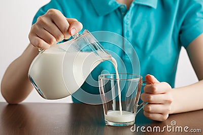 Girl pouring healthy lifestyle milk food Stock Photo