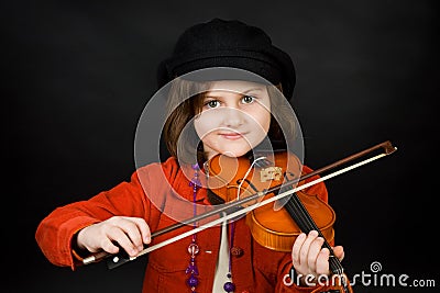 Girl practicing the violin Stock Photo