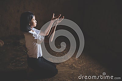 The girl prayed to God, open palm up worship., Concept for Christian, Christianity, Catholic religion, divine, heavenly, celestial Stock Photo