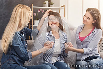 Girl preparing for wedding and showing bridal veil Stock Photo