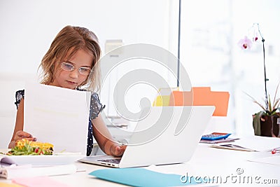 Girl Pretending To Be Businesswoman Working At Desk Stock Photo