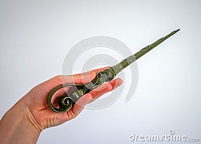 Hermione Granger cosplay out of Hogwarts wiht a magic wand Stock Photo