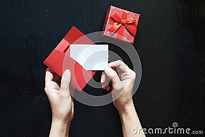A girl puts in an envelope her Love message Stock Photo