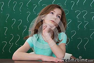 Girl With Question Mark Drawn On The Chalkboard Stock Photo