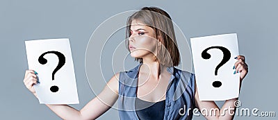 Girl question. Woman with doubtful expression and question marks. Thinking woman. Getting answers, thinking Stock Photo