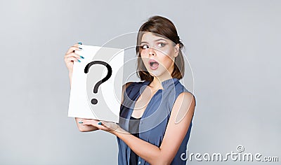 Girl question. Woman with doubtful expression and question marks. Thinking woman. Getting answers, thinking. Question Stock Photo