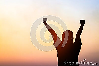 Young women raise their hands and be happy Stock Photo