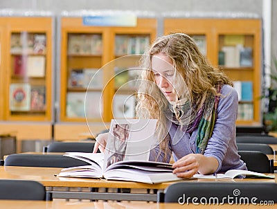 Girl read book in library Stock Photo