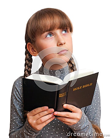 Girl reading a Bible Stock Photo