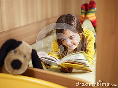 Girl reading book Stock Photo