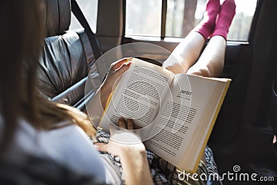 Girl Reading Book Road Trip Concept Stock Photo