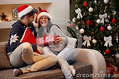 Girl receive present from boy for holiday Stock Photo