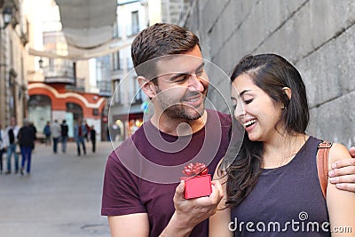 Girl receiving a surprise from his loved one Stock Photo