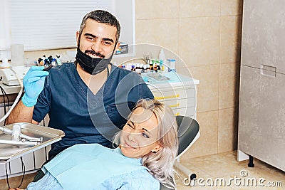 A girl at the reception dentist in a dental chair Stock Photo