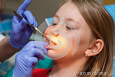 Girl on a reception for stomatology Stock Photo