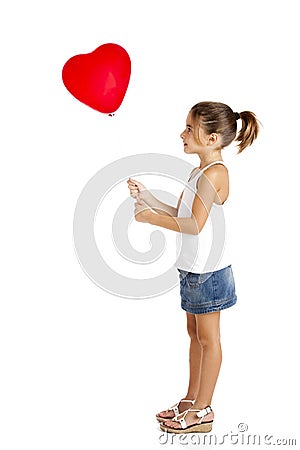 Girl with a red balloon Stock Photo