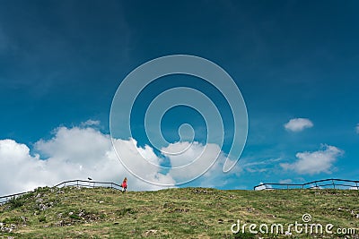 Girl in red dress at birÃ³w limestone hill Stock Photo