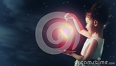 Girl with red heart Stock Photo