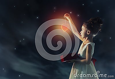 Girl with red heart Stock Photo