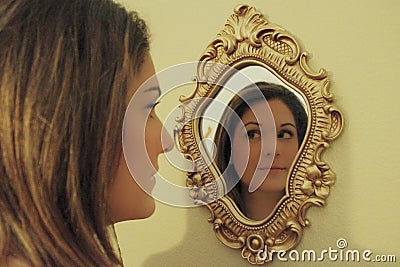 Girl reflection in mirror Stock Photo