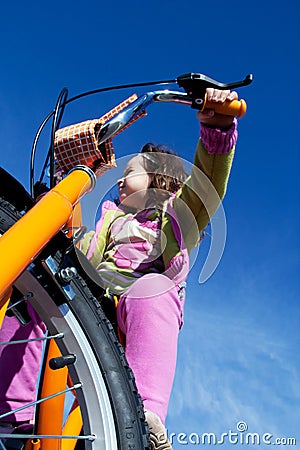 Girl riding a bicycle Stock Photo