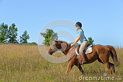 Girl Riding Horse Stock Photo