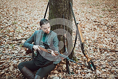 Girl with rifle. chase hunting. Gun shop. woman with weapon. Target shot. successful hunt. hunting sport. female hunter Stock Photo
