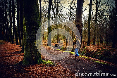 Girl runs in the forest Stock Photo