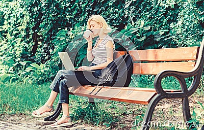 Girl runs her blog on notebook. modern woman with notebook blogging outdoor. summer online. Morning chart. girl blogger Stock Photo